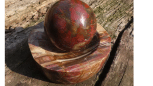 Polished Petrified Red Podocarpus Wood Sphere & Bowl - From Mahajanga, Madagascar